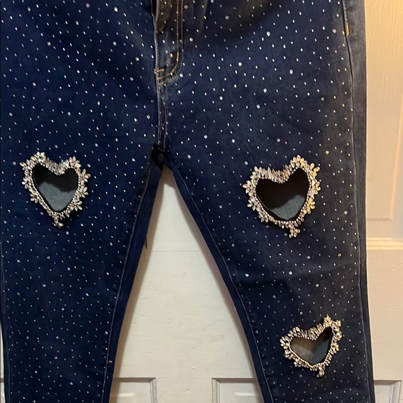 Stylish Women's Blue Jeans with Heart Cutouts - Picture 2 of 9